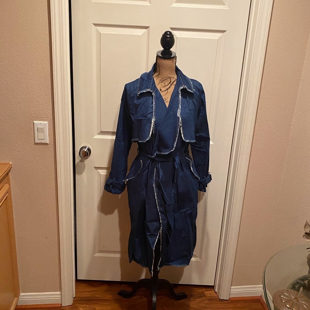 Denim distressed trench.